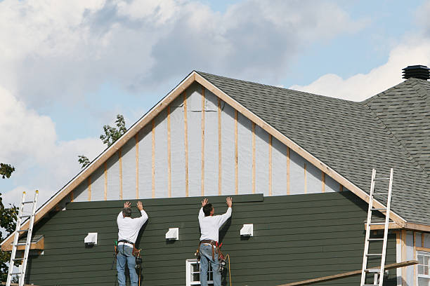 Professional Siding Installation technician working in Rossiter, PA